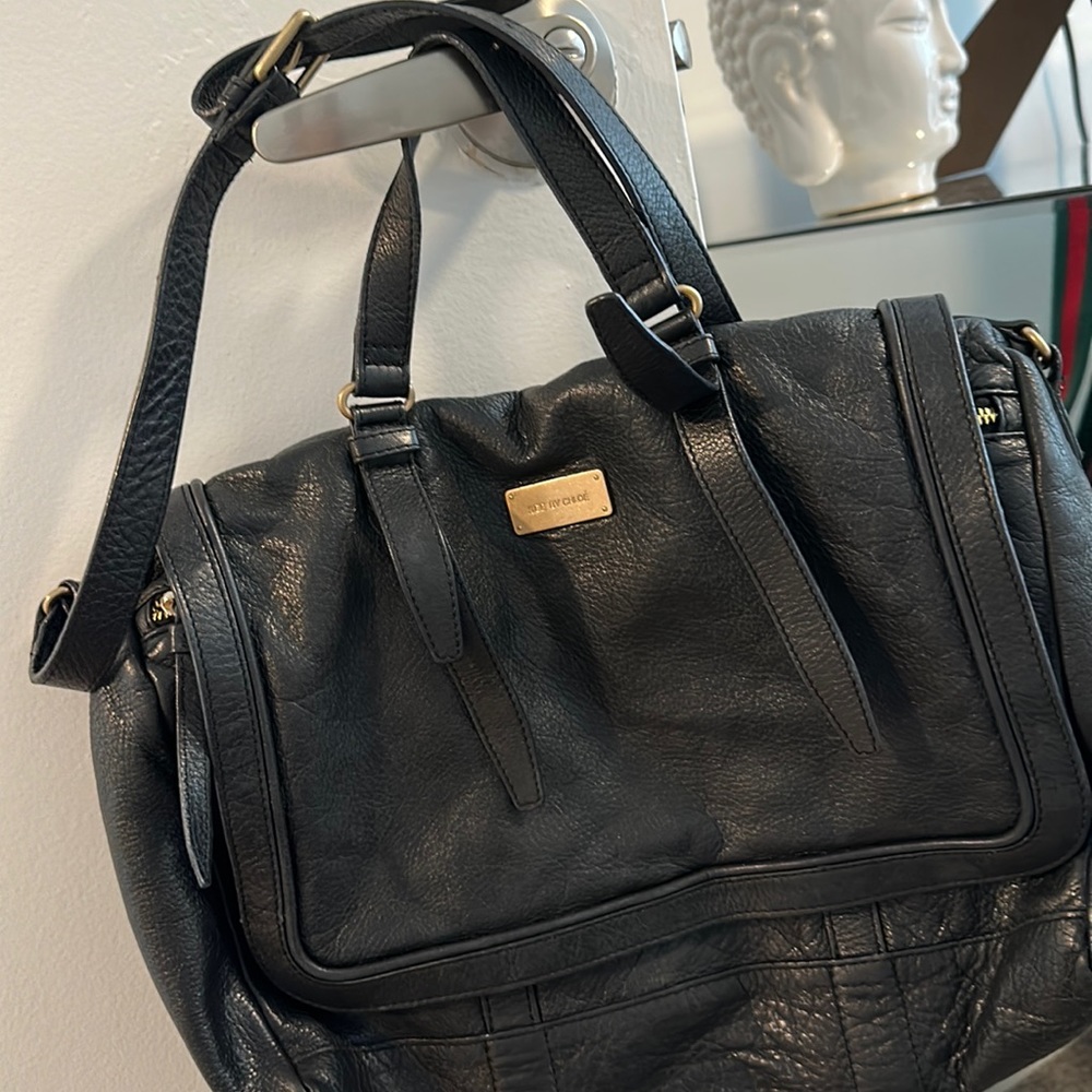 See By Chloe black bag, short/long handle options/in excellent shape! Great bag